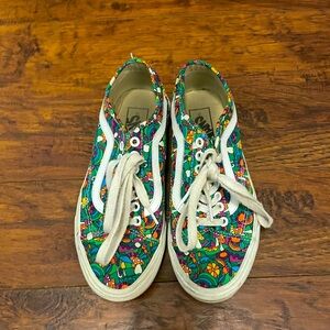 Size 8, colorful Vans.